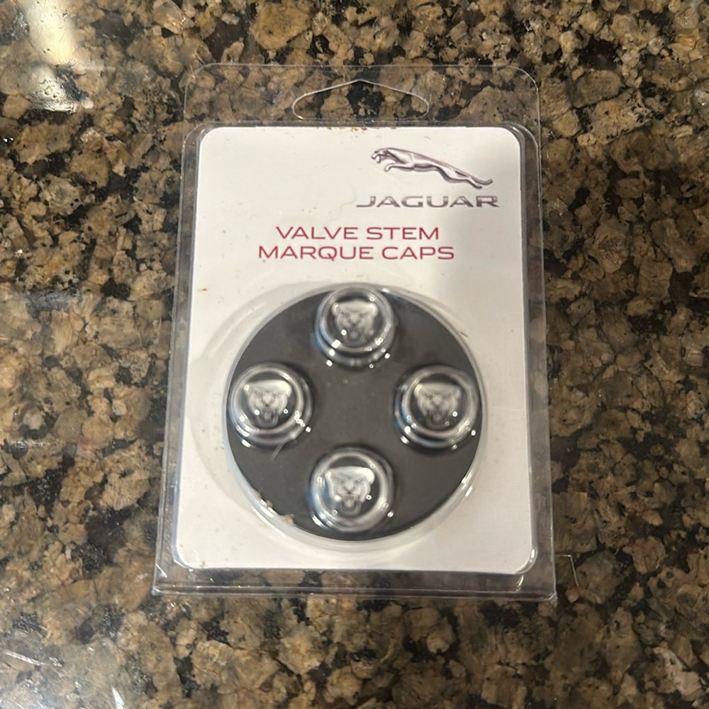 Jaguar tire caps